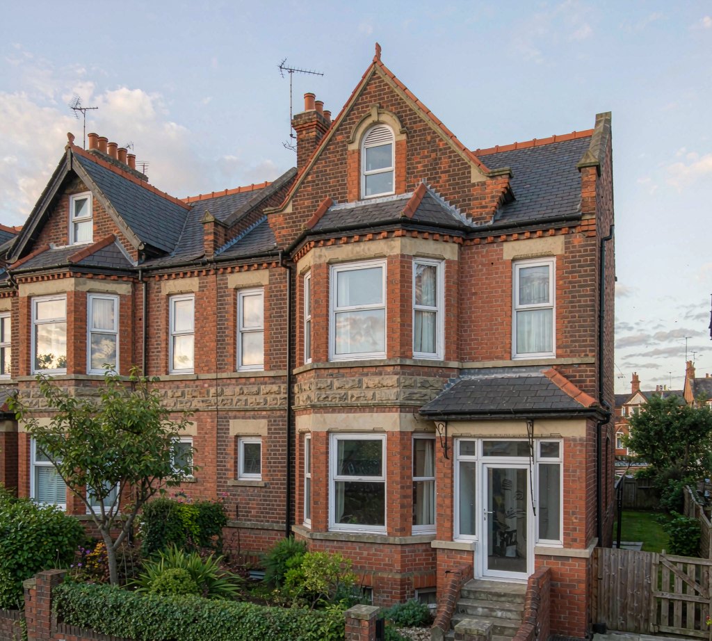 A three-bedroom terraced house with a small front garden